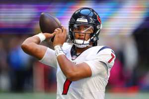 New Orleans, USA. 27th Aug, 2023. Houston Texans quarterback C.J. Stroud  (7) attempts a pass while facing a heavy pass rush from New Orleans Saints  defensive ends Tanoh Kpassagnon (92) and Carl