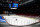 VANCOUVER, BC - MARCH 31: A rink attendant pushes a game net off the ice after the NHL game between the Calgary Flames and the Vancouver Canucks was postponed due to a positive COVID test result of a player at Rogers Arena on March 31, 2021 in Vancouver, British Columbia, Canada. (Photo by Jeff Vinnick/NHLI via Getty Images)