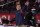 Arizona head coach Sean Miller waves after a win over Southern California during an NCAA college basketball game Saturday, Feb. 20, 2021, in Los Angeles. (AP Photo/Marcio Jose Sanchez)