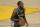 Milwaukee Bucks forward Khris Middleton brings the ball up against the Golden State Warriors during the second half of an NBA basketball game in San Francisco, Tuesday, April 6, 2021. (AP Photo/Jeff Chiu)