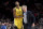 Golden State Warriors forward Kevin Durant, left, helps escort coach Steve Kerr after Kerr was ejected during the second half of the team's NBA basketball game against the Portland Trail Blazers in Portland, Ore., Wednesday, Feb. 13, 2019. The Blazers won 129-107. (AP Photo/Steve Dykes)