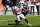 CHARLOTTE, NORTH CAROLINA - DECEMBER 13:  DaeSean Hamilton #17 of the Denver Broncos carries the ball against Juston Burris #31 of the Carolina Panthers during the second quarter at Bank of America Stadium on December 13, 2020 in Charlotte, North Carolina. (Photo by Jared C. Tilton/Getty Images)