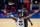 PHILADELPHIA, PA - APRIL 14: Joel Embiid #21 of the Philadelphia 76ers reacts in front of Jeff Green #8 of the Brooklyn Nets after making a basket and getting fouled in the third quarter at the Wells Fargo Center on April 14, 2021 in Philadelphia, Pennsylvania. NOTE TO USER: User expressly acknowledges and agrees that, by downloading and or using this photograph, User is consenting to the terms and conditions of the Getty Images License Agreement. (Photo by Mitchell Leff/Getty Images)
