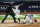 New York Yankees' Rougned Odor falls into the home plat umpire after running past Houston Astros catcher Martin Maldonado to score during the sixth inning of a baseball game Tuesday, May 4, 2021, in New York. (AP Photo/Frank Franklin II)