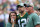 GREEN BAY, WI - SEPTEMBER 15:  Green Bay Packers quarterback Aaron Rodgers (12) watches a tribute to Bart Starr with Leann Nelson and Brett Favre during a game between the Green Bay Packers and the Minnesota Vikings on September 15, 2019 at Lambeau Field in Green Bay, WI. (Photo by Larry Radloff/Icon Sportswire via Getty Images)