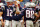 FOXBOROUGH, MA - OCTOBER 14: Patriots quarterback Tom Brady (left),was happy to see suspended wide receiver Terry Glenn (#88) as he comes onto the field, and gives him a high five prior to New England's 29-26 come from behind victory over the San Diego Chargers. He was probably more happy that he was back later in the afternoon, as the two teamed to help lead the home team to a win. (Photo by Jim Davis/The Boston Globe via Getty Images)
