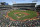FILE - The Los Angeles Angels and Oakland Athletics stand for the national anthem at the Oakland Coliseum prior to an opening day baseball game in Oakland, Calif., in this Thursday, March 29, 2018, file photo.Major League Baseball instructed the Athletics to explore relocation options as the team tries to secure a new ballpark it hopes will keep the club in Oakland in the long term. MLB released a statement Tuesday, May 11, 2021, expressing its longtime concern that the current Coliseum site is “not a viable option for the future vision of baseball.” (AP Photo/Ben Margot, File)