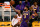 LOS ANGELES, CALIFORNIA - MAY 11: Anthony Davis #3 of the Los Angeles Lakers attempts a layup between Julius Randle #30 and Reggie Bullock #25 of the New York Knicks during the first quarter at Staples Center on May 11, 2021 in Los Angeles, California. (Photo by Harry How/Getty Images)  NOTE TO USER: User expressly acknowledges and agrees that, by downloading and or using this photograph, User is consenting to the terms and conditions of the Getty Images License Agreement.