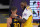 Los Angeles Lakers forward LeBron James, right, greets Golden State Warriors guard Stephen Curry after the Lakers defeated the Golden State Warriors 103-100 in an NBA basketball Western Conference Play-In game Wednesday, May 19, 2021, in Los Angeles. (AP Photo/Mark J. Terrill)