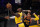 Los Angeles Lakers forward LeBron James, left, shoots as Golden State Warriors forward Juan Toscano-Anderson defends during the first half of an NBA basketball Western Conference Play-In game Wednesday, May 19, 2021, in Los Angeles. (AP Photo/Mark J. Terrill)