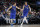 Dallas Mavericks' Luka Doncic (77) and Kristaps Porzingis (6) celebrate a basket by Porzingis in the second half of an NBA basketball game against the Portland Trail Blazers in Dallas, Sunday, Oct. 27, 2019. (AP Photo/Tony Gutierrez)