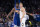 PHILADELPHIA, PA - DECEMBER 10: Joel Embiid #21 of the Philadelphia 76ers guards Nikola Jokic #15 of the Denver Nuggets in the first quarter at the Wells Fargo Center on December 10, 2019 in Philadelphia, Pennsylvania. NOTE TO USER: User expressly acknowledges and agrees that, by downloading and/or using this photograph, user is consenting to the terms and conditions of the Getty Images License Agreement. (Photo by Mitchell Leff/Getty Images)