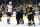 BOSTON, MA - MAY 19: Linesman Vaughn Rody (73) steps in between Washington Capitals right wing Tom Wilson (43) and Boston Bruins right defenseman Kevan Miller (86) during Game 3 of the NHL Stanley Cup Playoffs First Round between the Boston Bruins and the Washington Capitals on May 19, 2021, at TD Garden in Boston, Massachusetts. (Photo by Fred Kfoury III/Icon Sportswire via Getty Images)
