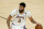 Los Angeles Lakers forward Anthony Davis dribbles the ball against the Phoenix Suns during the first half of Game 1 of their NBA basketball first-round playoff series Sunday, May 23, 2021, in Phoenix. (AP Photo/Ross D. Franklin)