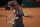 Naomi Osaka of Japan returns the ball to Jessica Pegula of the United States during their match at the Italian Open tennis tournament, in Rome, Wednesday, May 12, 2021. Osaka lost against Pegula 7-6, 6-2. (AP Photo/Alessandra Tarantino)