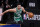Boston Celtics forward Jayson Tatum (0) runs up court with the ball during the first quarter of Game 2 of an NBA basketball first-round playoff series against the Brooklyn Nets, Tuesday, May 25, 2021, in New York. (AP Photo/Kathy Willens)