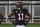 FILE - In this Sunday, Dec. 6, 2020, file photo, Atlanta Falcons wide receiver Julio Jones (11) warms up before an NFL football game against the New Orleans Saints in Atlanta. The Atlanta Falcons began their offseason training program Tuesday, May 25, 2021, without longtime star receiver Julio Jones, who apparently has no intention of returning to a rebuilding team that is still struggling to get under the salary cap. (AP Photo/Danny Karnik, File)