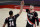 Portland Trail Blazers forward Norman Powell, left, celebrates with center Jusuf Nurkic, right, during the second half of Game 4 of an NBA basketball first-round playoff series against the Denver Nuggets in Portland, Ore., Saturday, May 29, 2021. The Blazers won 1115-95. (AP Photo/Steve Dykes)