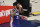 Philadelphia 76ers center Joel Embiid (21) gestures to the crowd after his dunk during the first half of Game 3 in a first-round NBA basketball playoff series against the Washington Wizards, Saturday, May 29, 2021, in Washington. (AP Photo/Nick Wass)