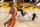 Los Angeles Lakers forward LeBron James, right, falls after being fouled as Phoenix Suns guard Chris Paul stands at left during the second half in Game 4 of an NBA basketball first-round playoff series Sunday, May 30, 2021, in Los Angeles. (AP Photo/Mark J. Terrill)