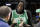 Former Boston Celtics' Kevin Garnett chats before an NBA basketball game between the Boston Celtics and the Los Angeles Lakers, Thursday, Feb. 7, 2019, in Boston. (AP Photo/Elise Amendola)