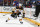 UNIONDALE, NEW YORK - JUNE 03:  Brad Marchand #63 of the Boston Bruins chases down the puck against the New York Islanders during the second period in Game Three of the Second Round of the 2021 Stanley Cup Playoffs at Nassau Coliseum on June 03, 2021 in Uniondale, New York. (Photo by Mike Stobe/NHLI via Getty Images)
