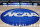 FILE - In this March 18, 2015, file photo, the NCAA logo is displayed at center court as work continues at The Consol Energy Center in Pittsburgh, for the NCAA college basketball tournament. The NCAA is opening a door for states with legalized sports gambling to host NCAA championship events. The governing body for college sports on Thursday, May 17, 2018, announced a "temporary" lifting of a ban that prevented events like college basketball's NCAA Tournament from being hosted in states that accept wagers on single games. (AP Photo/Keith Srakocic, File)