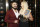 NEW YORK, NEW YORK - APRIL 05: WWE Superstars Andrade and Charlotte Flair attend the WWE Superstars For Hope Reception on April 05, 2019 in New York City. (Photo by Brian Ach/Getty Images for WWE)