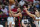 Portland Trail Blazers guard CJ McCollum shoots in front of Denver Nuggets forward Michael Porter Jr. during the second half of Game 6 of an NBA basketball first-round playoff series Thursday, June 3, 2021, in Portland, Ore. (AP Photo/Craig Mitchelldyer)