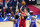 Atlanta Hawks' Trae Young (11) goes up for a shot against Philadelphia 76ers' Joel Embiid (21), Matisse Thybulle (22) and Seth Curry (31) during the second half of Game 5 in a second-round NBA basketball playoff series, Wednesday, June 16, 2021, in Philadelphia. (AP Photo/Matt Slocum)