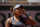 PARIS, FRANCE - MAY 30: Naomi Osaka of Japan looks to her team during her match against Patricia Maria Țig of Romania in the first round of the women’s singles at Roland Garros on May 30, 2021 in Paris, France.