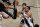 Milwaukee Bucks' Giannis Antetokounmpo, upper right, drives past Brooklyn Nets' Joe Harris during the second half of Game 7 of a second-round NBA basketball playoff series Saturday, June 19, 2021, in New York. (AP Photo/Frank Franklin II)