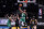 Boston Celtics center Tristan Thompson (13) and Brooklyn Nets forward Kevin Durant (7) and Nets guard James Harden (13) watch as Celtics guard Kemba Walker (8) goes up for a backwards shot during the second half of Game 2 of an NBA basketball first-round playoff series, Tuesday, May 25, 2021, in New York. (AP Photo/Kathy Willens)