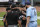 Toronto Blue Jays starting pitcher Alek Manoah, right, talks with umpires, from left, Jerry Meals, Vic Carapazza and Jansen Visconti after Manoah was ejected in the fourth inning of a baseball game against the Baltimore Orioles, Saturday, June 19, 2021, in Baltimore. The incident happened as a result of Manoah hitting Orioles' Maikel Franco with a pitch after Manoah gave up back-to-back home runs to Ryan Mountcastle and DJ Stewart. (AP Photo/Julio Cortez)