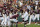 Mississippi State infielder Kellum Clark (11), center, celebrates a three-run home run against Vanderbilt during the seventh inning in Game 3 of the NCAA College World Series baseball finals, Wednesday, June 30, 2021, in Omaha, Neb. (AP Photo/Rebecca S. Gratz)