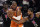 Los Angeles Clippers guard Paul George, right, reaches in on Phoenix Suns guard Chris Paul during the second half in Game 6 of the NBA basketball Western Conference Finals Wednesday, June 30, 2021, in Los Angeles. (AP Photo/Mark J. Terrill)