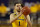 Michigan center Hunter Dickinson plays during the first half of an NCAA college basketball game, Thursday, March 4, 2021, in Ann Arbor, Mich. (AP Photo/Carlos Osorio)