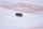 A hockey puck with the Flyers logo rests on the ice during an NHL hockey game between the Philadelphia Flyers and the New York Rangers, Saturday, March 27, 2021, in Philadelphia. (AP Photo/Derik Hamilton)