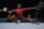 Simone Biles competes in the floor exercise during the women's U.S. Olympic Gymnastics Trials Sunday, June 27, 2021, in St. Louis. (AP Photo/Jeff Roberson)