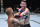 LAS VEGAS, NEVADA - JULY 24: (L-R) T.J. Dillashaw punches Corey Sandhagen in their bantamweight fight during the UFC Fight Night event at UFC APEX on July 24, 2021 in Las Vegas, Nevada. (Photo by Jeff Bottari/Zuffa LLC)