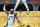 Orlando Magic guard Terrence Ross (31) goes up past Indiana Pacers guard T.J. McConnell, right, for a dunk during the second half of an NBA basketball game, Friday, April 9, 2021, in Orlando, Fla. (AP Photo/John Raoux)