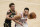 Atlanta Hawks' Trae Young (11) fouls Philadelphia 76ers' Ben Simmons (25) during the first half of Game 4 of a second-round NBA basketball playoff series on Monday, June 14, 2021, in Atlanta. (AP Photo/Brynn Anderson)