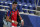 Novak Djokovic, of Serbia, walks off the court after losing a semifinal men's tennis match to Alexander Zverev, of Germany, at the 2020 Summer Olympics, Friday, July 30, 2021, in Tokyo, Japan. (AP Photo/Patrick Semansky)