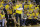 Golden State Warriors owner & CEO Joe Lacob, center, stands during a timeout during the second half of Game 1 of a first-round NBA basketball playoff series between the Warriors and the Portland Trail Blazers in Oakland, Calif., Sunday, April 16, 2017. The Warriors won 121-109. (AP Photo/Jeff Chiu)