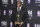 Magic Johnson poses in the press room with the lifetime achievement award at the NBA Awards on Monday, June 24, 2019, at the Barker Hangar in Santa Monica, Calif. (Photo by Richard Shotwell/Invision/AP)