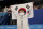 Shin Jeahwan, of South Korea, celebrates after winning the gold medal for the vault during the artistic gymnastics men's apparatus final at the 2020 Summer Olympics, Monday, Aug. 2, 2021, in Tokyo, Japan. (AP Photo/Ashley Landis)