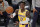 Los Angeles Lakers guard Dennis Schroder (17) passes during Game 3 of an NBA basketball first-round playoff series against the Phoenix Suns Thursday, May 27, 2021, in Los Angeles. (AP Photo/Marcio Jose Sanchez)