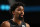 CHARLOTTE, NC - DECEMBER 27: Spencer Dinwiddie #26 of the Brooklyn Nets looks on during the game against the Charlotte Hornets on December 27, 2020 at Spectrum Center in Charlotte, North Carolina. NOTE TO USER: User expressly acknowledges and agrees that, by downloading and or using this photograph, User is consenting to the terms and conditions of the Getty Images License Agreement. Mandatory Copyright Notice: Copyright 2020 NBAE (Photo by Kent Smith/NBAE via Getty Images)