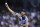Los Angeles Dodgers starting pitcher Trevor Bauer throws against the Arizona Diamondbacks during the first inning of a baseball game Friday, June 18, 2021, in Phoenix. (AP Photo/Ross D. Franklin)