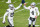 DENVER, CO - JANUARY 03: Las Vegas Raiders running back Josh Jacobs (28) and quarterback Derek Carr (4) celebrate after a fourth quarter touchdown during a game between the Denver Broncos and the Las Vegas Raiders at Empower Field at Mile High on January 3, 2021 in Denver, Colorado. (Photo by Dustin Bradford/Icon Sportswire via Getty Images)